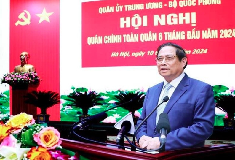 Prime Minister Pham Minh Chinh addresses the national political-military conference on July 10 (Photo: VNA)