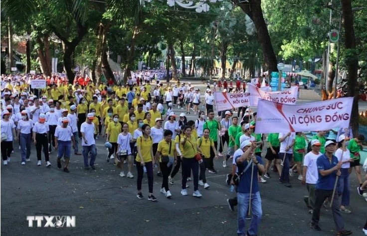 More than 5,000 people join in a walk in support of AO/dioxin victims on the occasion of the Action Month for Victims of AO/Dioxin in August 2023.