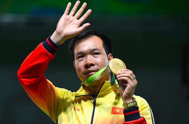Marksman Hoang Xuan Vinh becomes the first-ever and only athlete from the country to win an Olympic gold medal. (Photo: anninhthudo.vn)