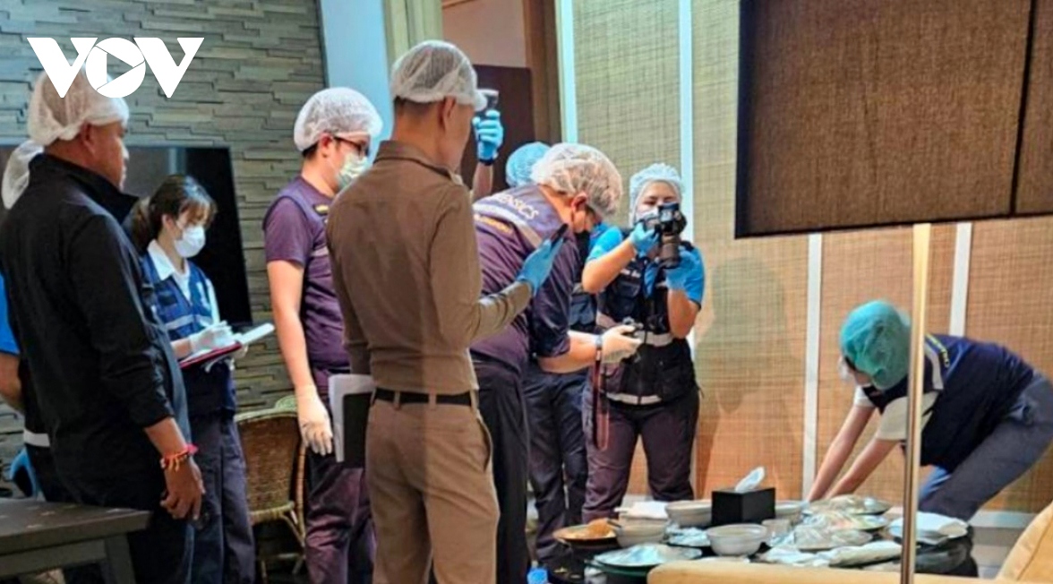 Competent authorities of Thailand examine the scene in the hotel room