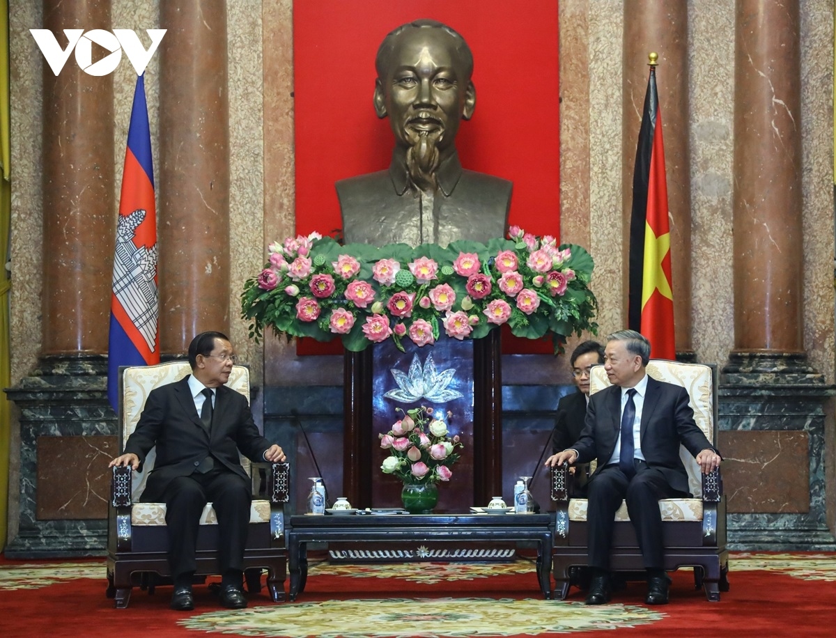 Vietnamese President To Lam (R) receives Hun Sen, head of the Cambodian People's Party and President of the Senate of Cambodia, in Hanoi on July 25