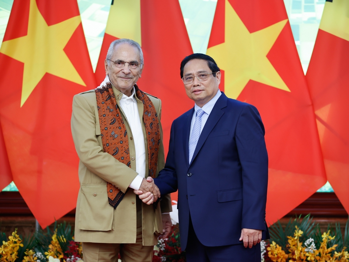 Vietnamese Prime Minister Pham Minh Chinh (R) and visiting Timor Leste President Jose Ramos-Horta during their meeting in Hanoi on August 2