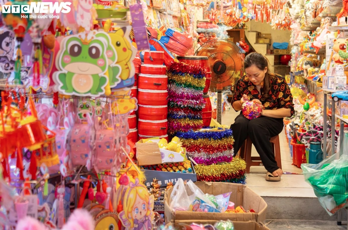 Shops located along the street display both traditional and modern decorative items and toys for children ahead of the Mid-Autumn festival.