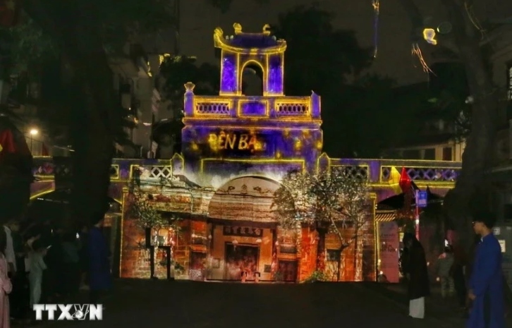 A 3D mapping light show at O Quan Chuong in Hanoi