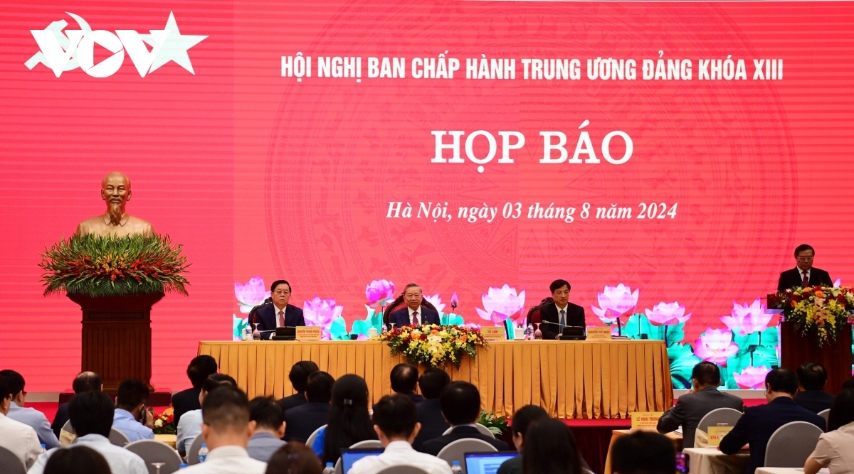 Newly elected Party General Secretary To Lam (second from left) at the press briefing in Hanoi on August 3