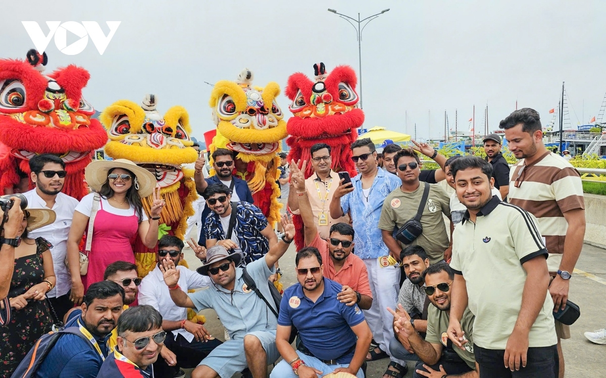 A group of Indian travellers visit Ha Long Bay, a World Heritage site in Quang Ninh province