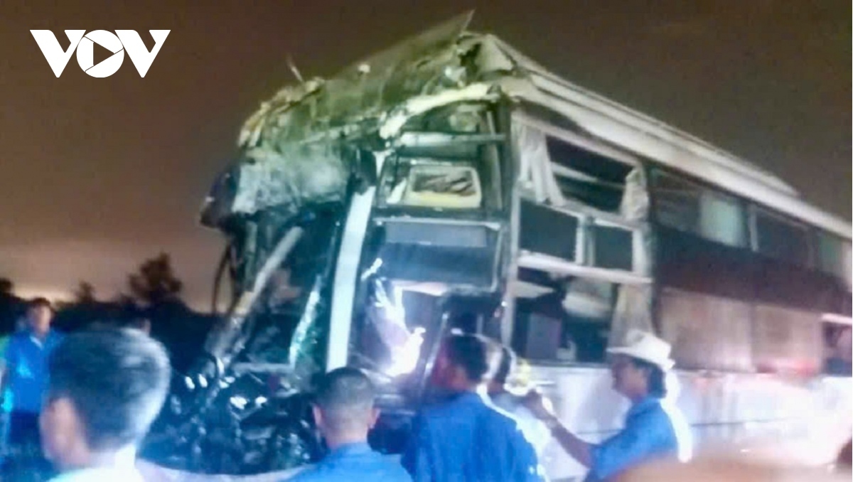 The sleeper bus has been severely damaged after the collision.