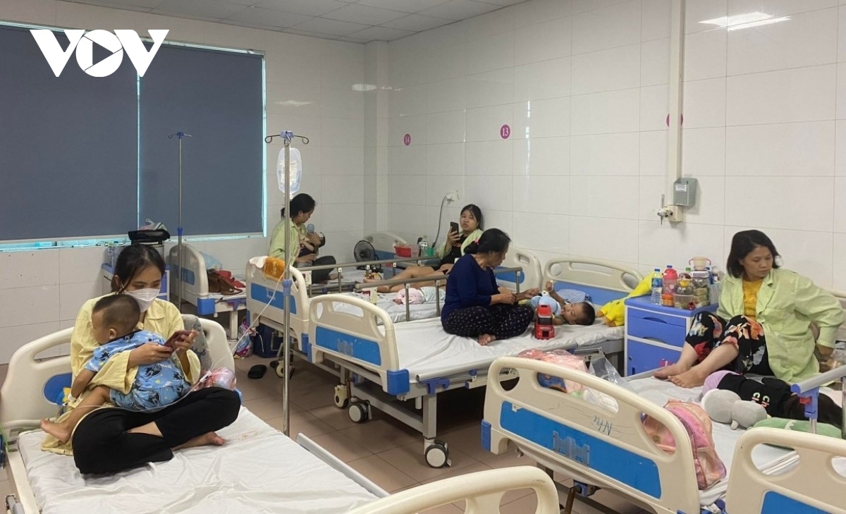 Child patients with dengue fever receives treatment at a hospital in HCM City 