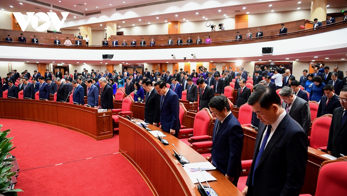 Participants observe a minute of silence in memory of residents, officers, and soldiers who were killed by typhoon Yagi and its aftermath.