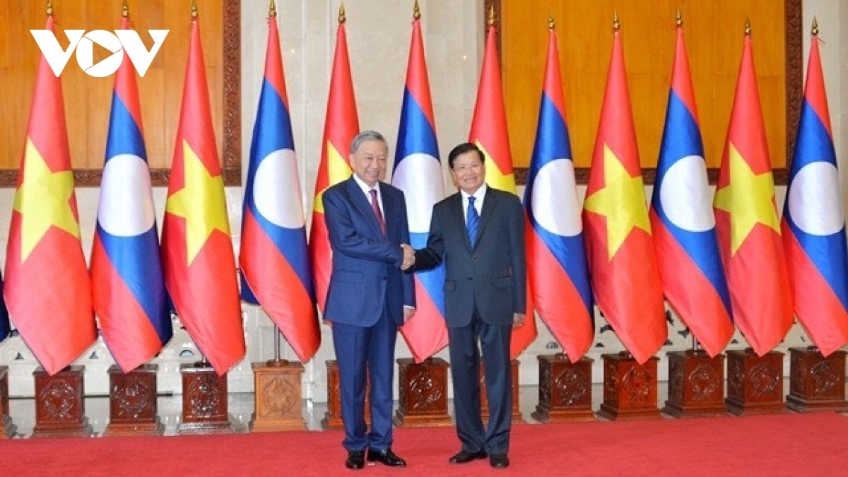 Party General Secretary and President of Vietnam To Lam (L) and his Lao counterpart Thongloun Sisoulith during their meeting in Vientiane in July 2024