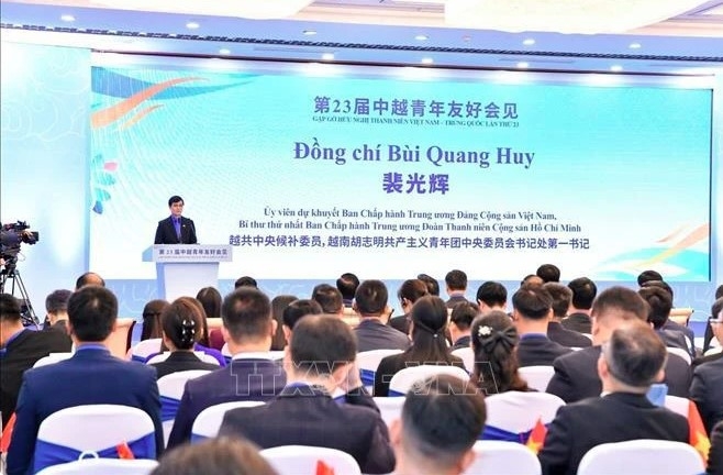 Bui Quang Huy, alternate member of the Communist Party of Vietnam Central Committee, First Secretary of the HCYU Central Committee and Chairman of the National Committee for Vietnamese Youth, speaks at the opening ceremony of the 23rd Vietnam - China youth friendship meeting on October 14.