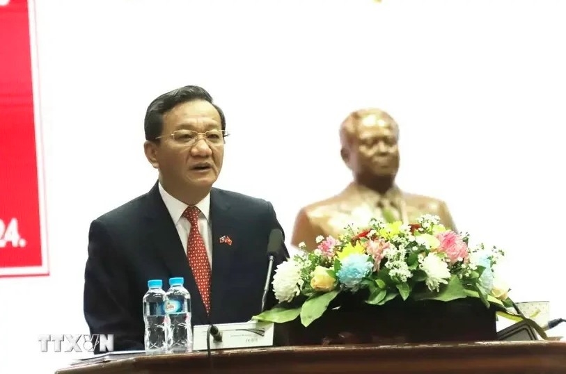 Vietnamese Ambassador to Laos Nguyen Minh Tam speaks at the event