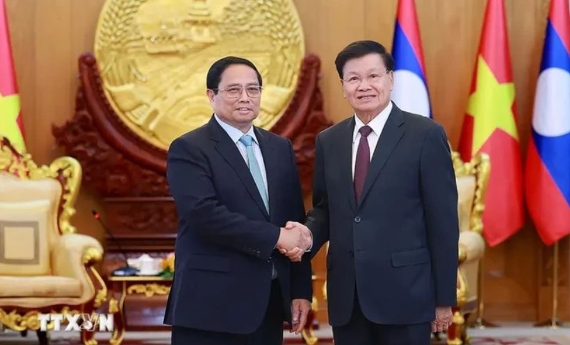 Prime Minister Pham Minh Chinh meets with Party General Secretary and President of Laos Thongloun Sisoulith. (Photo: VNA)