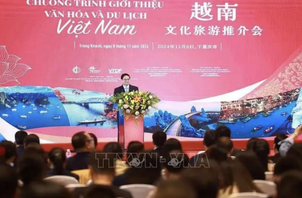 Prime Minister Pham Minh Chinh speaks at a programme introducing Vietnam’s culture and tourism in Chongqing city on November 8. (Photo: VNA)