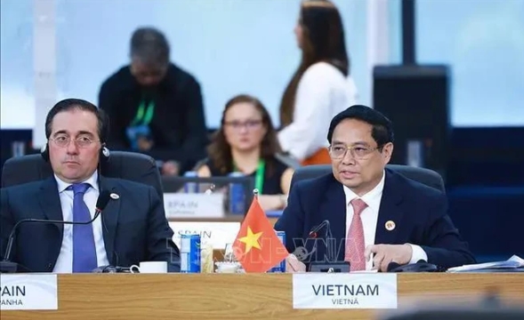 Prime Minister Pham Minh Chinh addresses the G20 Summit's discussion session on sustainable development and energy transition.