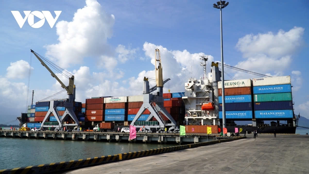 Loading goods for export at Chan May port in Thua Thien-Hue province
