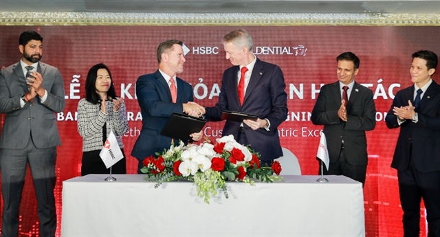 Prudential Vietnam and HSBC Vietnam sign a bancassurance partnership in HCM City on December 19. (Photo: My Phuong)