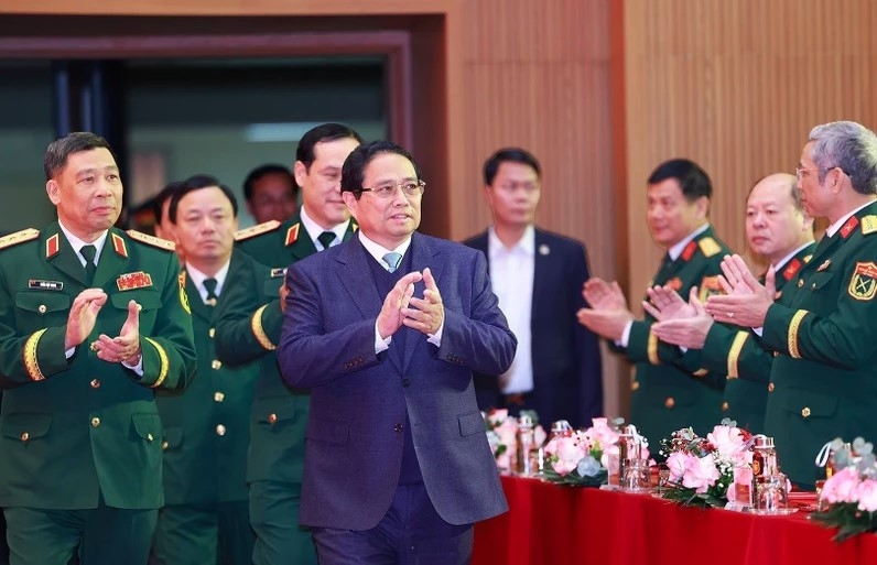 PM Pham Minh Chinh visits the National Defence Academy on December 12. (Photo: VNA)