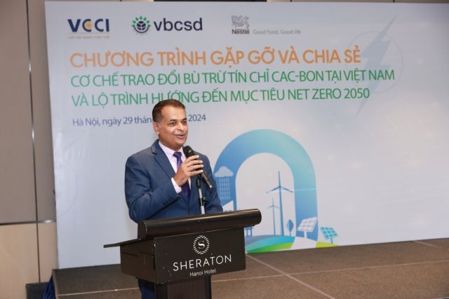 Binu Jacob, co-chairman of the Business Council for Sustainable Development (VBCSD) and general director of Nestlé Vietnam delivers a speech at the event. (Photo courtesy of the organiser)