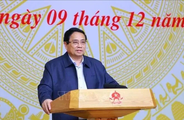 Prime Minister Pham Minh Chinh, who is also Chairman of the Central Emulation and Commendation Council, chairs its 10th meeting in Hanoi on December 9.