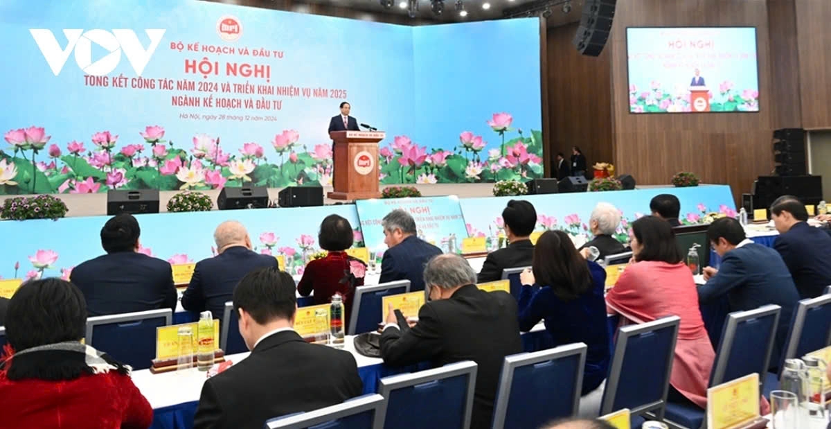 Delegates attend the MPI meeting in Hanoi on December 28