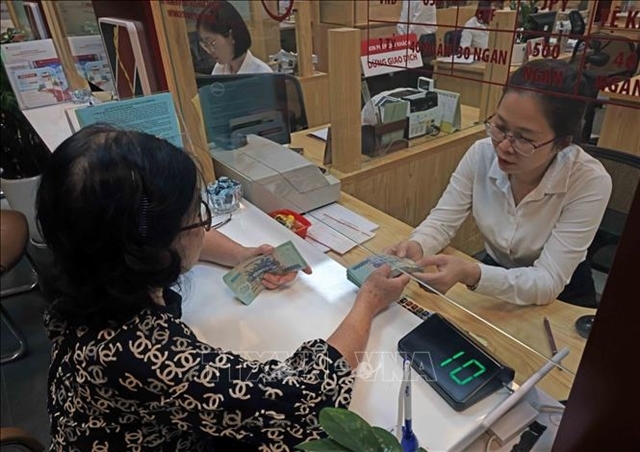 The lowest short-term loan interest rate is 4.5% per year, while the rate for medium and long-term loans fluctuate around 7.9% per year. (Photo: cafef.vn)