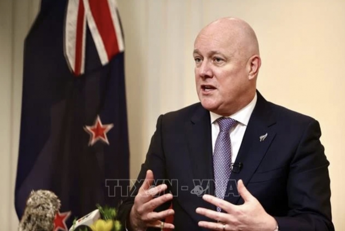 New Zealand Prime Minister Christopher Luxon speaks to the press. (Photo: VNA)