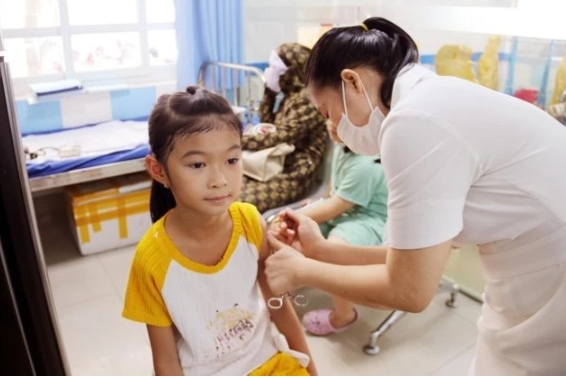 A child gets vaccinated against measles at the Centre for Disease Control in Ninh Thuan province.