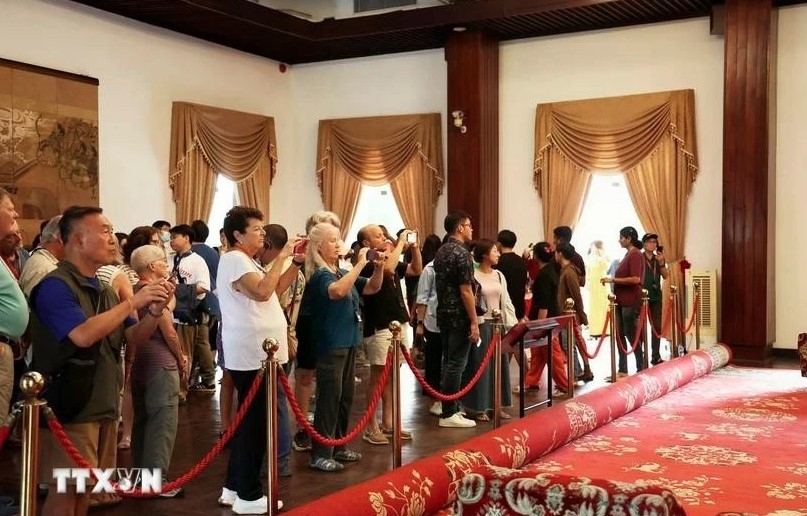 International tourists visit the Independence Palace in HCM City.