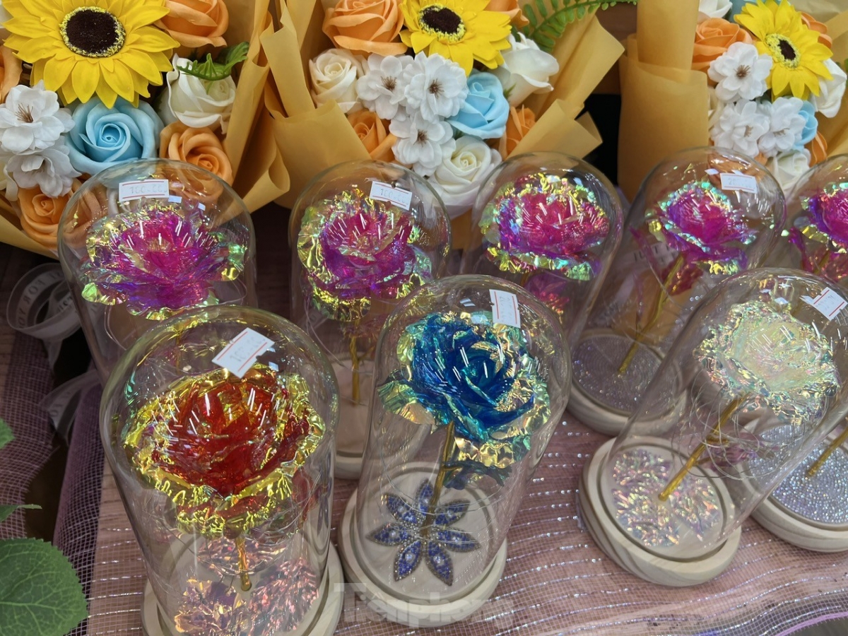Paper and wax flowers are also popular among customers.