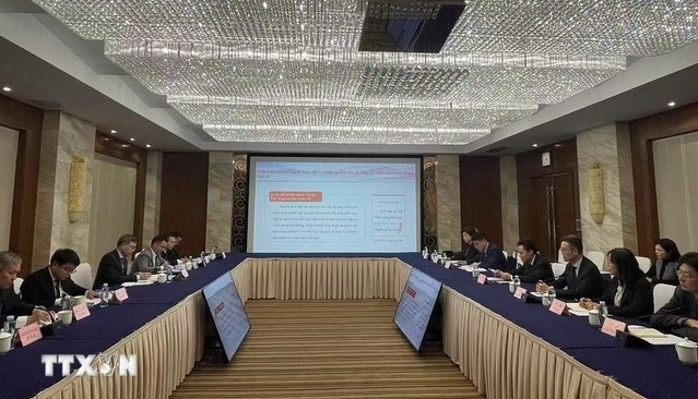 At the meeting between the leaders of the State Audit Office of Vietnam and the Audit Bureau of Chongqing. (Photo: VNA)
