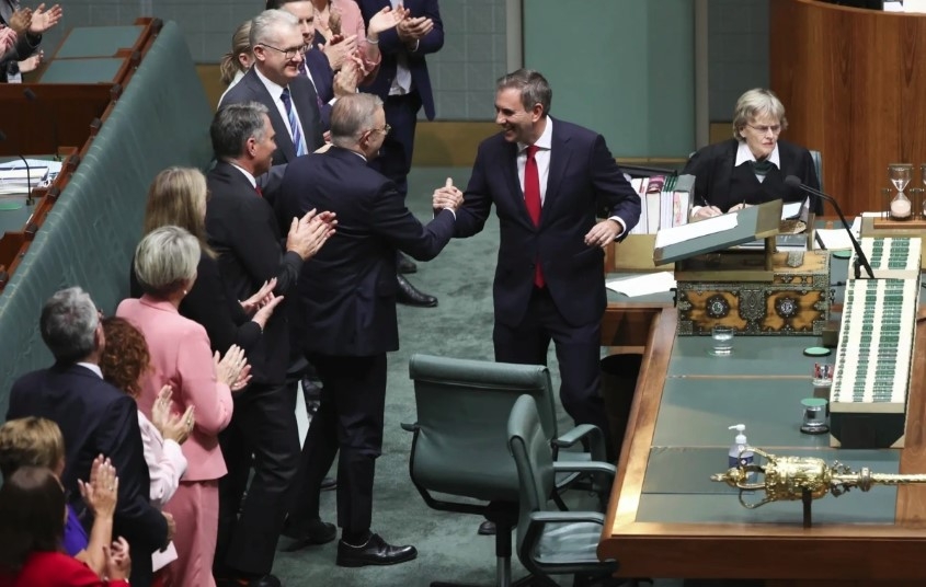 Australian Treasurer Jim Chalmers congratulated by Cabinet members after unveiling the budget plan
 (Source: Alex Ellinghausen)