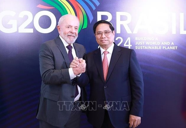 Brazilian President Luiz Inácio Lula da Silva (L) and Prime Minister Pham Minh Chinh. (Photo: VNA)