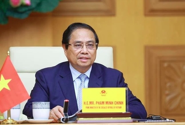 Prime Minister Pham Minh Chinh attends the virtual summit on climate action. (Photo: VNA)