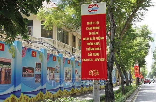 Panels and banners celebrate the 50th anniversary of national reunification in HCM City (Photo: VNA)