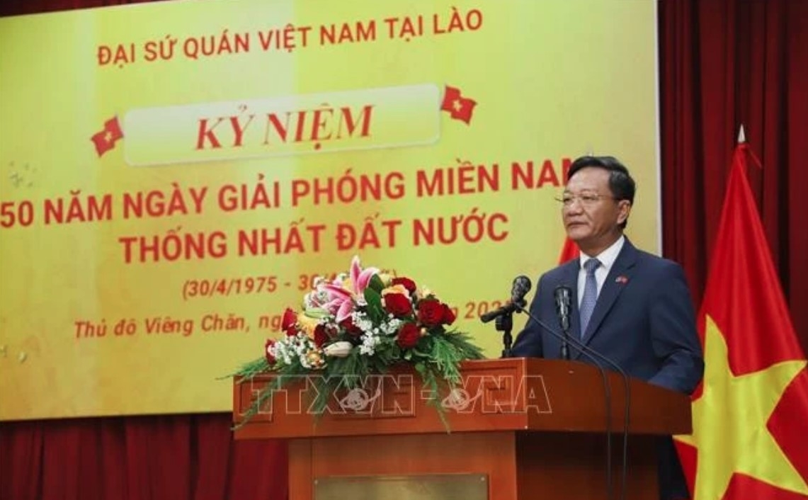 Vietnamese Ambassador to Laos Nguyen Minh Tam speaks at the event.