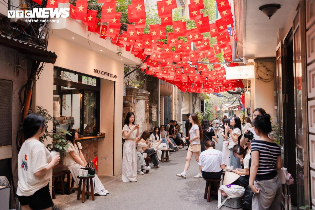 National flags light up the streets and alleys of the capital during the historic anniversary.