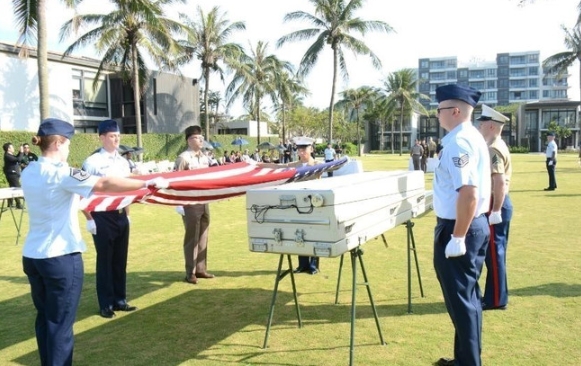 Four boxes containing remains handed over at the ceremony