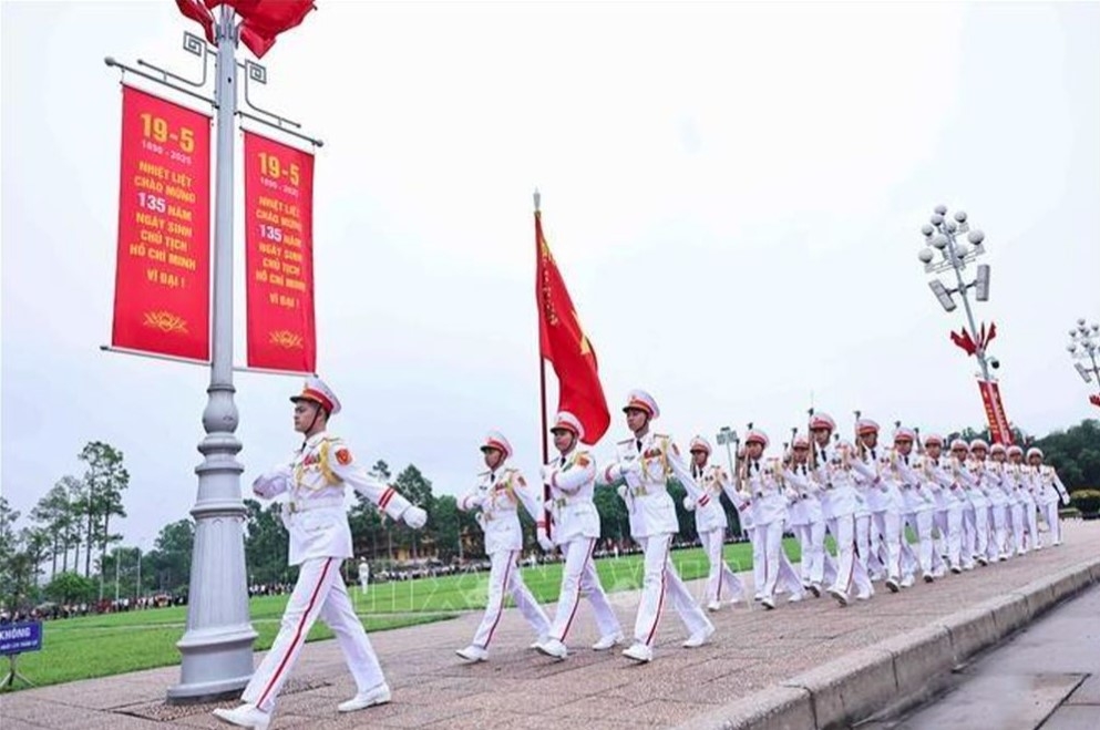 At 6 a.m., soldiers from the President Ho Chi Minh Mausoleum High Command get the event underway at the historic Ba Dinh Square in the capital.