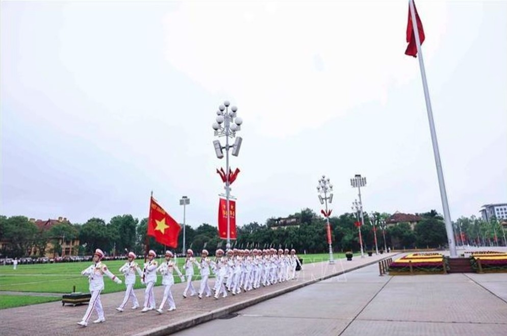 At the end of the ceremony, the guards march in front of the Ho Chi Minh Mausoleum and head back to their posts.