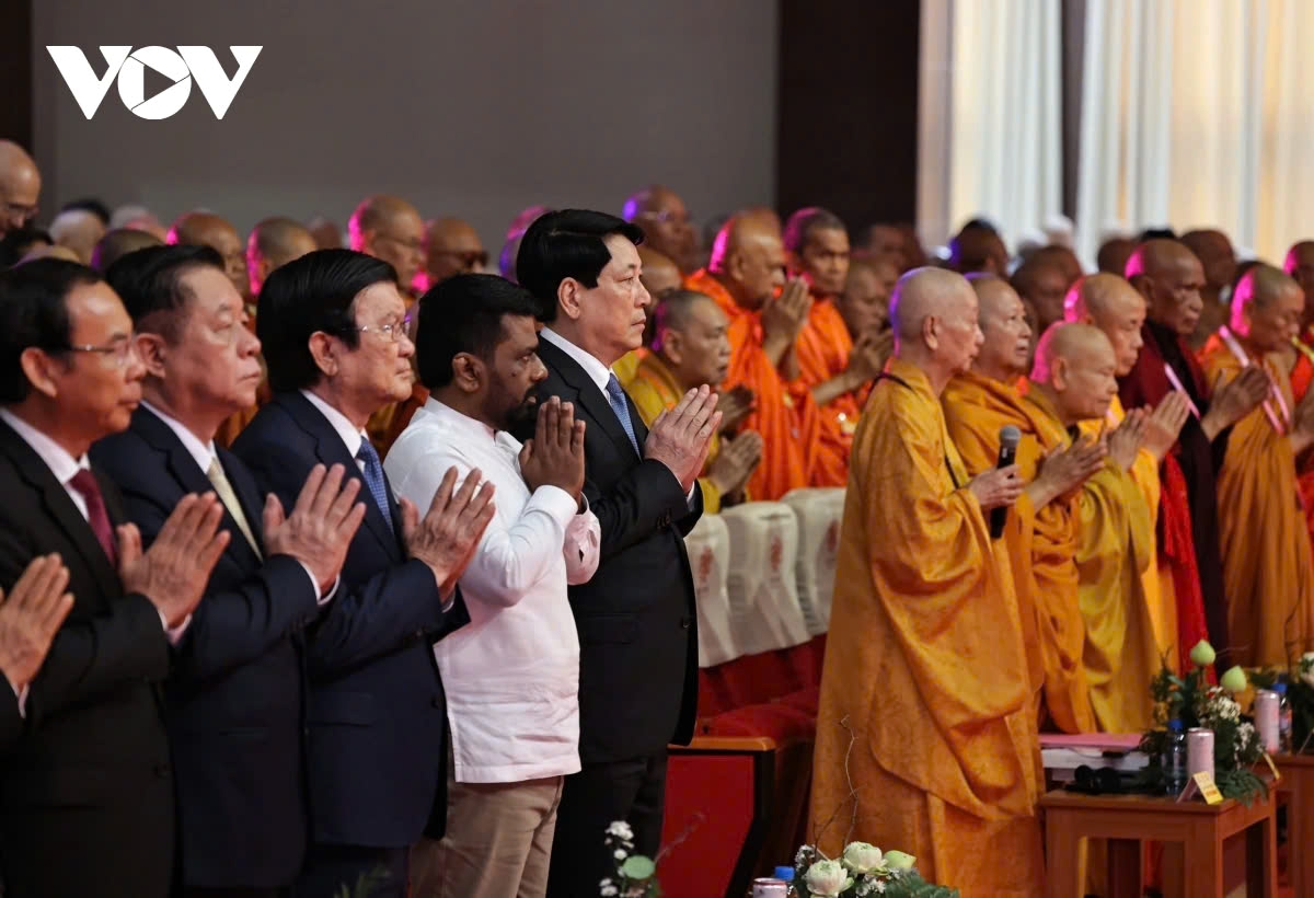 Vietnamese President Luong Cuong (first in black suit from right) and other senior delegates attend the opening ceremony of the UN Day of Vesak 2025 in Ho Chi Minh City on May 6