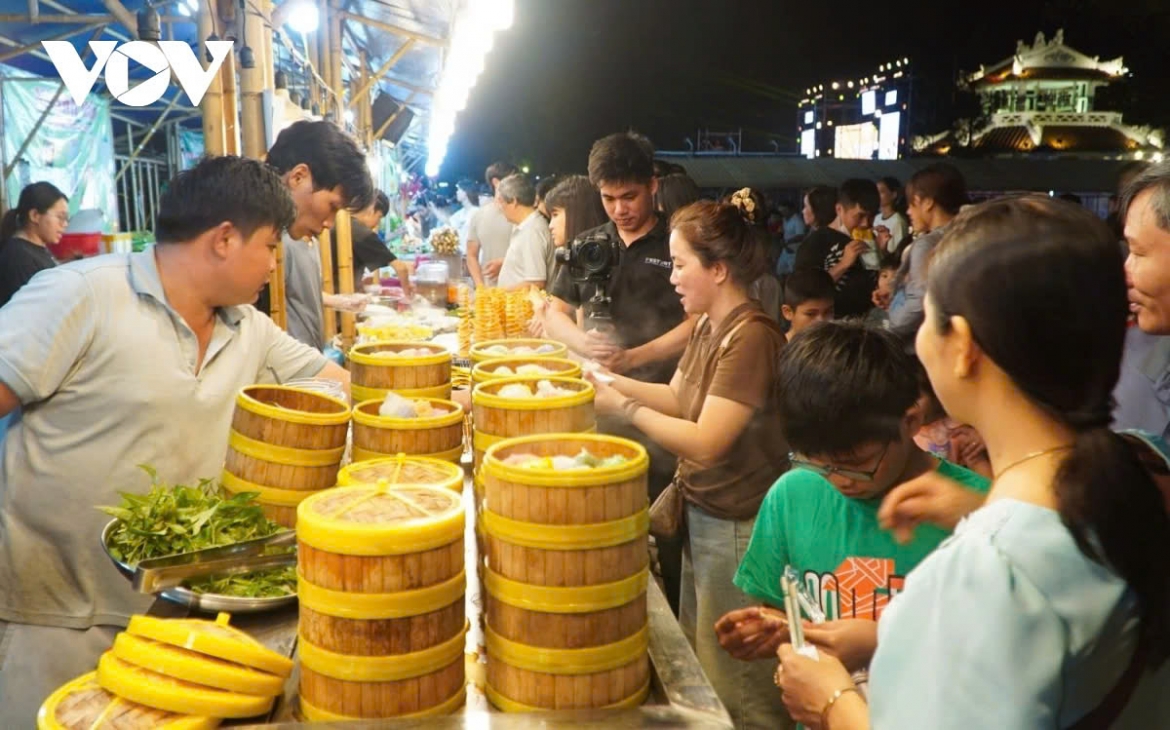 Visitors enjoy dishes in the former imperial city of Hue