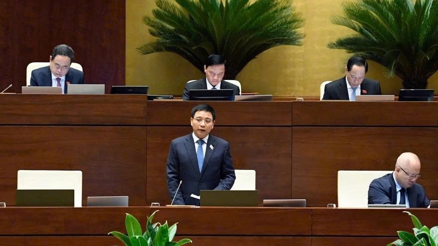 Minister of Finance Nguyen Van Thang fields questions relating to business development and public investment disbursement during the question time of the National Assembly on June 19