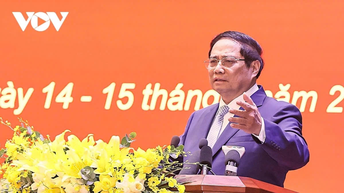 Prime Minister Pham Minh Chinh speaks at the conference in Hanoi on June 14