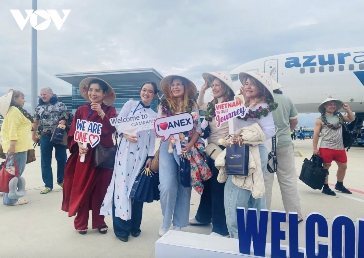 Russian tourists are welcomed at Cam Ranh International Airport on their flight back to Nha Trang City
