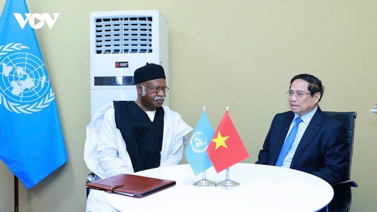 Vietnamese Prime Minister Pham Minh Chinh (R) meets with Philemon Yang, President of the 79th United Nations General Assembly session in Nice, France, on June 9, on the sidelines of the third UN Ocean Conference - UNOC 3