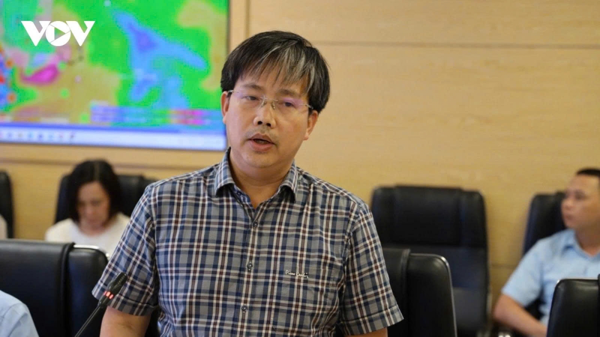 Mai Van Khiem, director of the National Centre for Hydro-Meteorological Forecasting, talks about scenarios of Wutip at a meeting in Hanoi on June 11