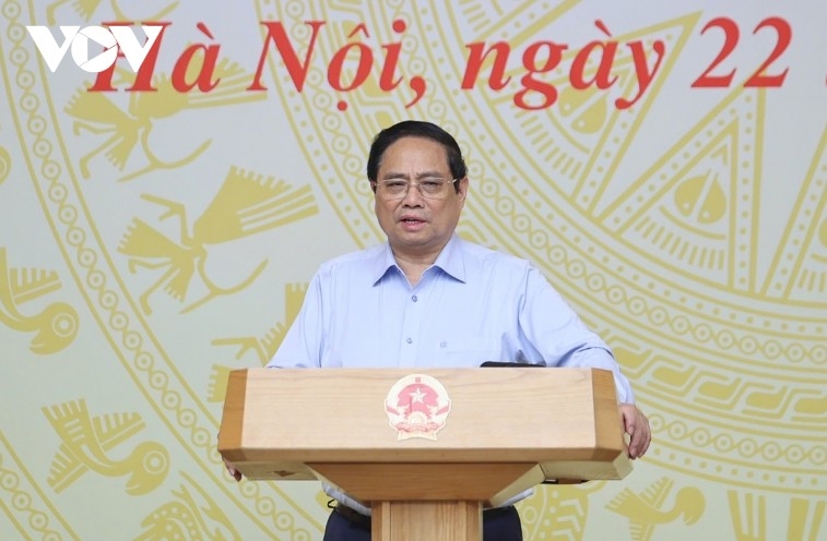  Prime Minister Pham Minh speaks at the meeting