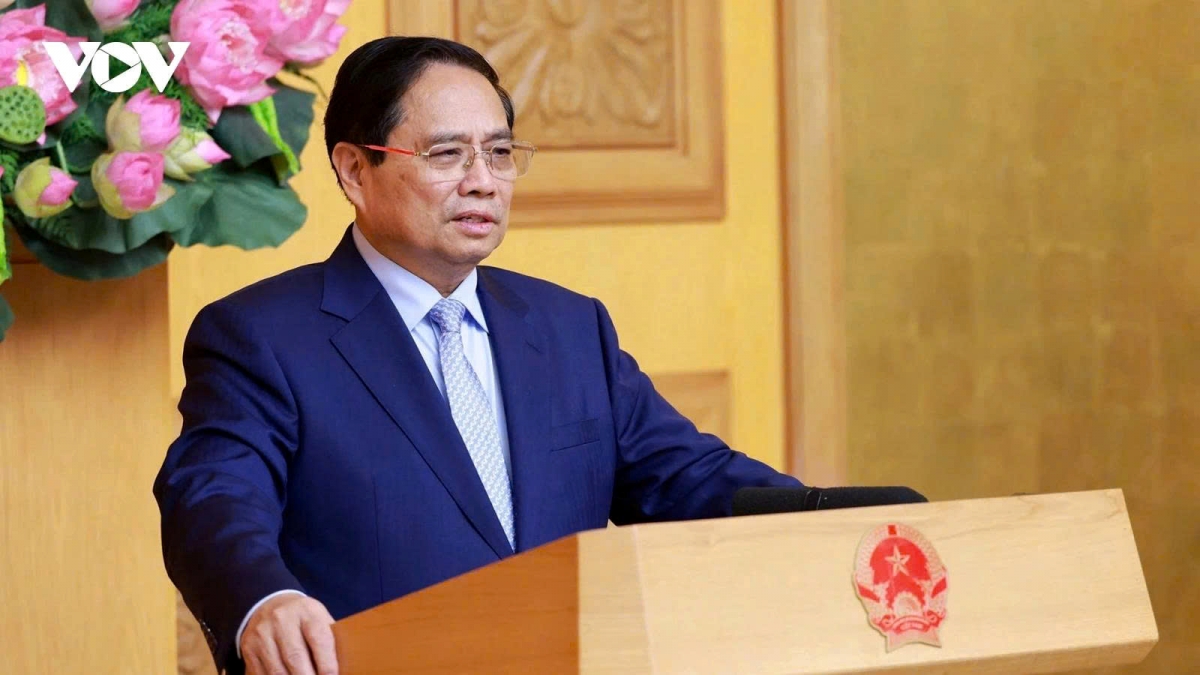 Prime Minister Pham Minh Chinh speaks at the meeting with UK businesses operating in Vietnam, in Hanoi on June 28
