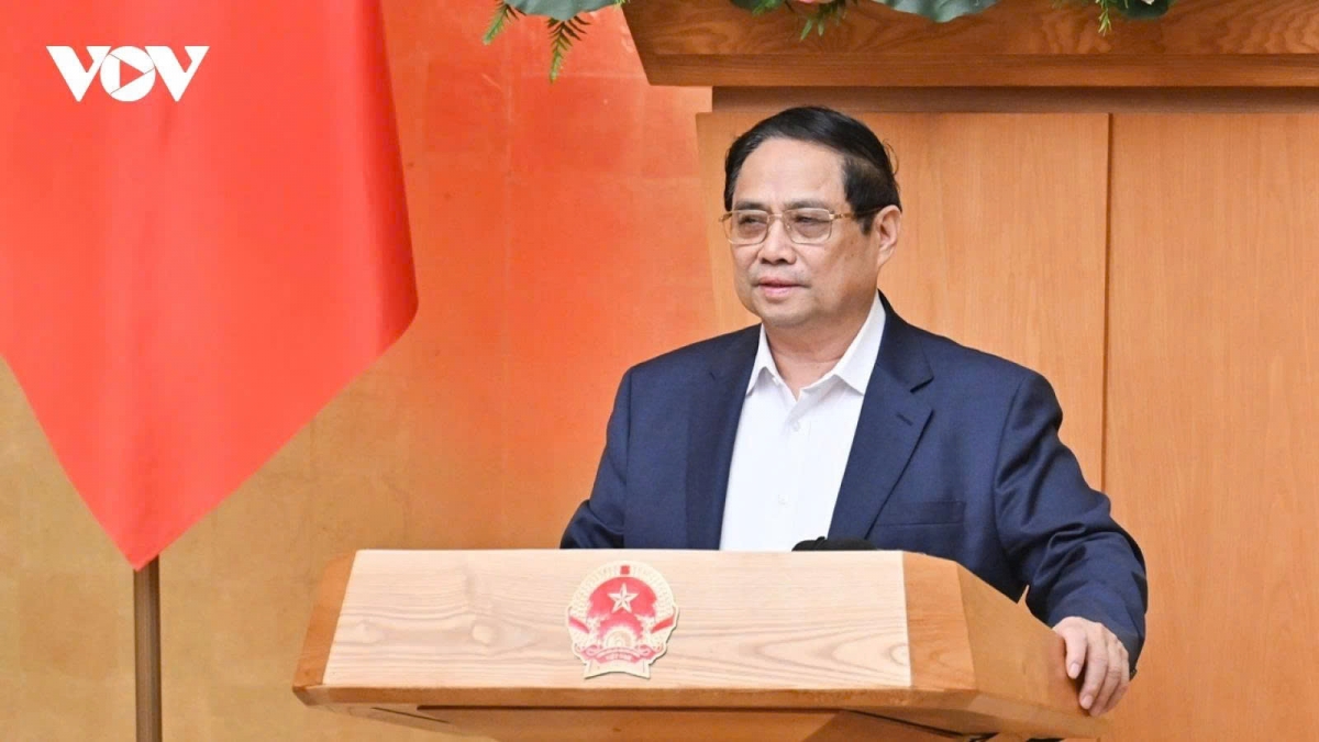 Prime Minister Pham Minh Chinh speaks at the monthly Government meeting for June in Hanoi on July 3